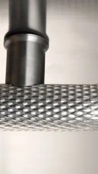 Textured stainless round handrail with returned end