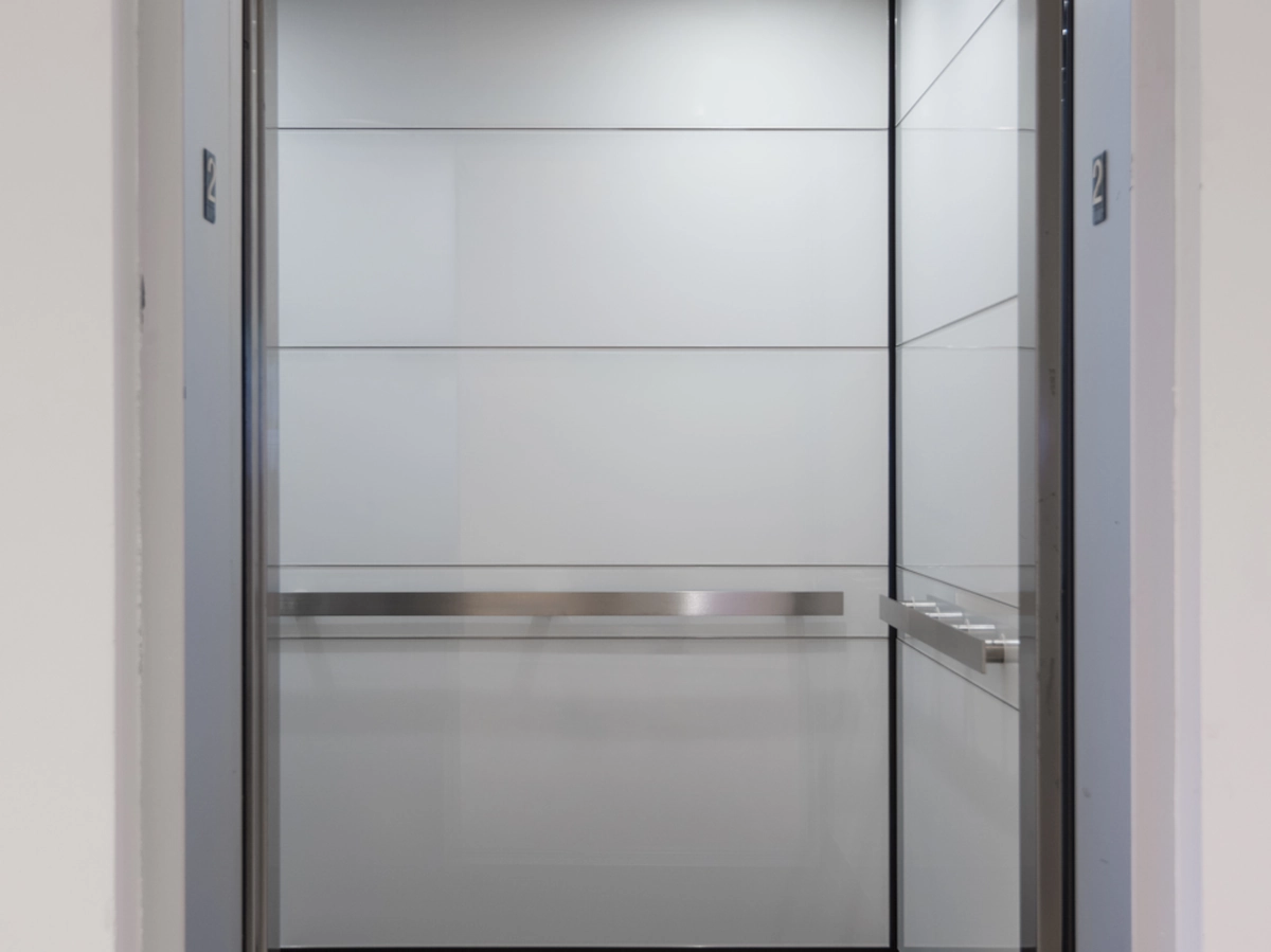 boston-series-elevator-interior-backpainted-white-glass-stainless-frames-15-d-m