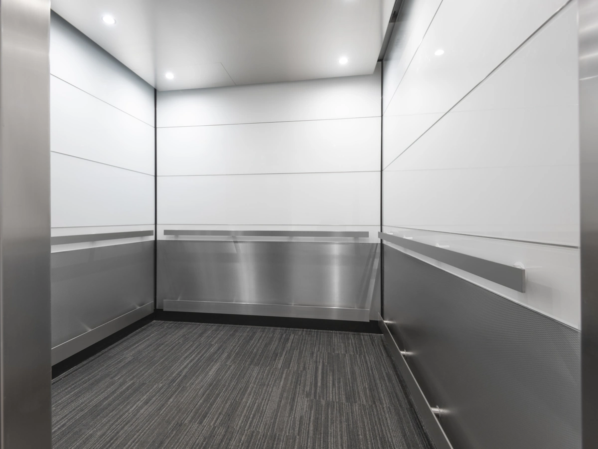 boston-series-elevator-interior-backpainted-white-glass-textured-stainless-9-d-m