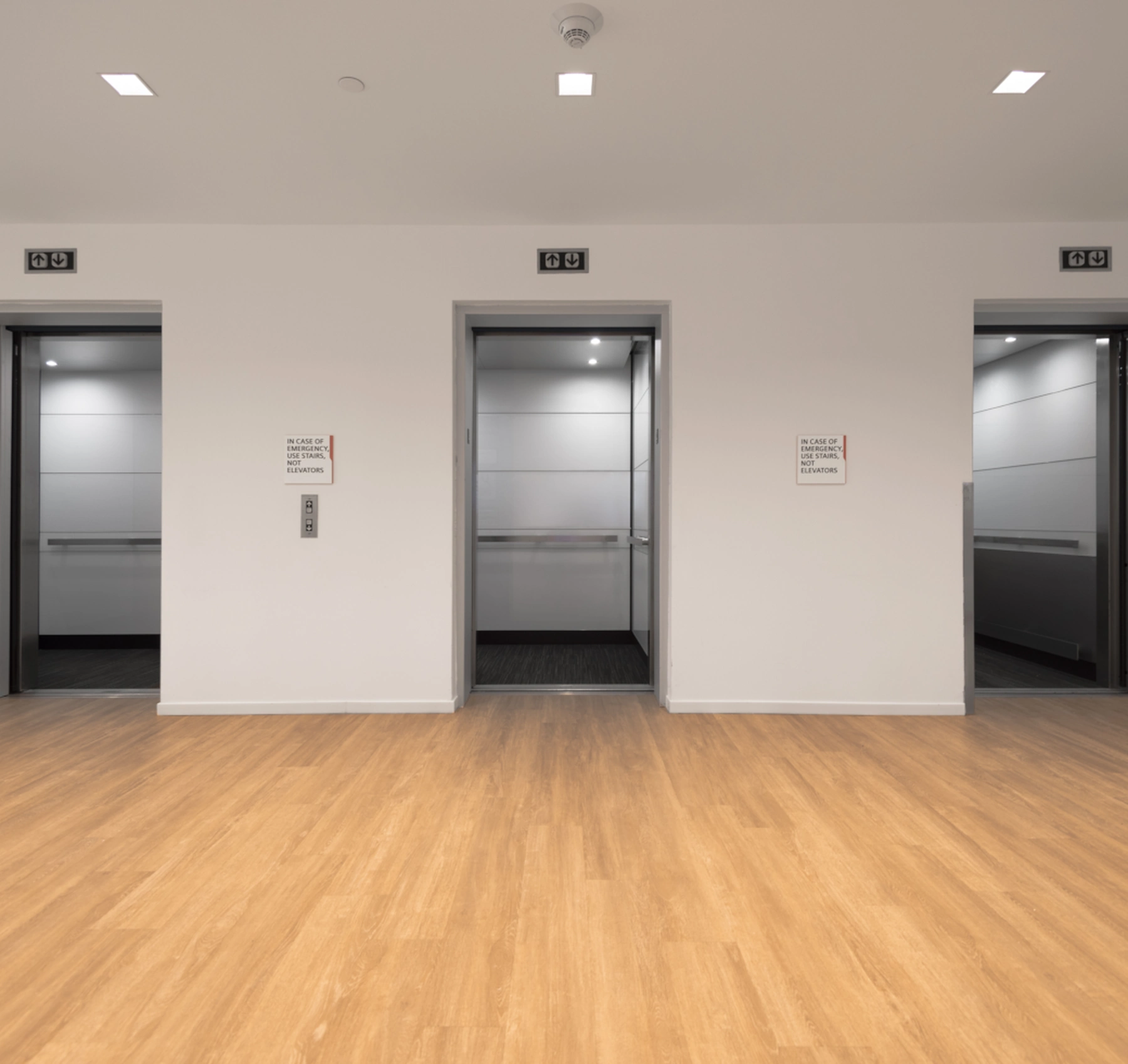 boston-series-elevator-interior-backpainted-white-glass-stainless-frames-23