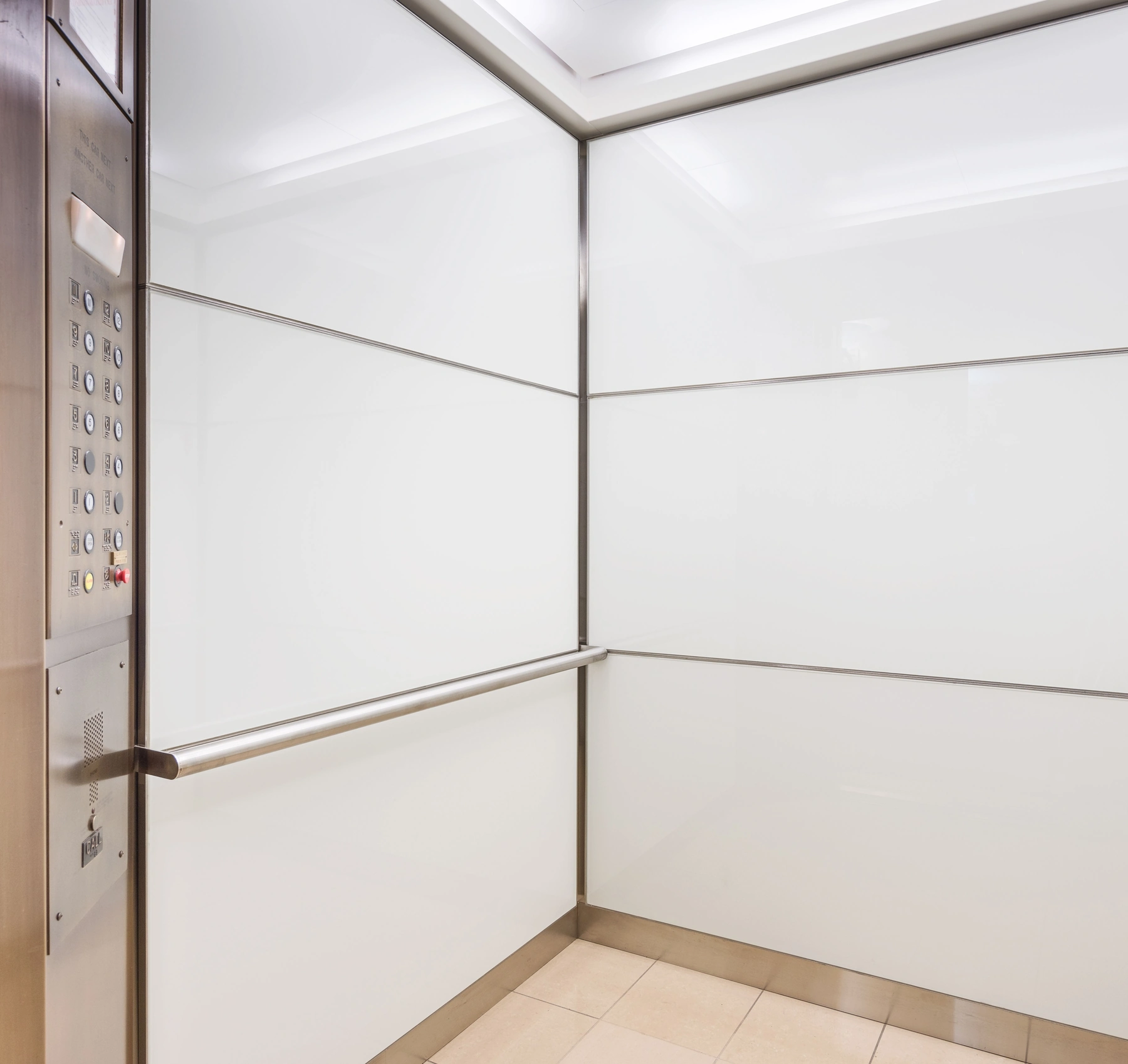 boston-series-elevator-interior-design-white-backpainted-glass-bronze-frames-1