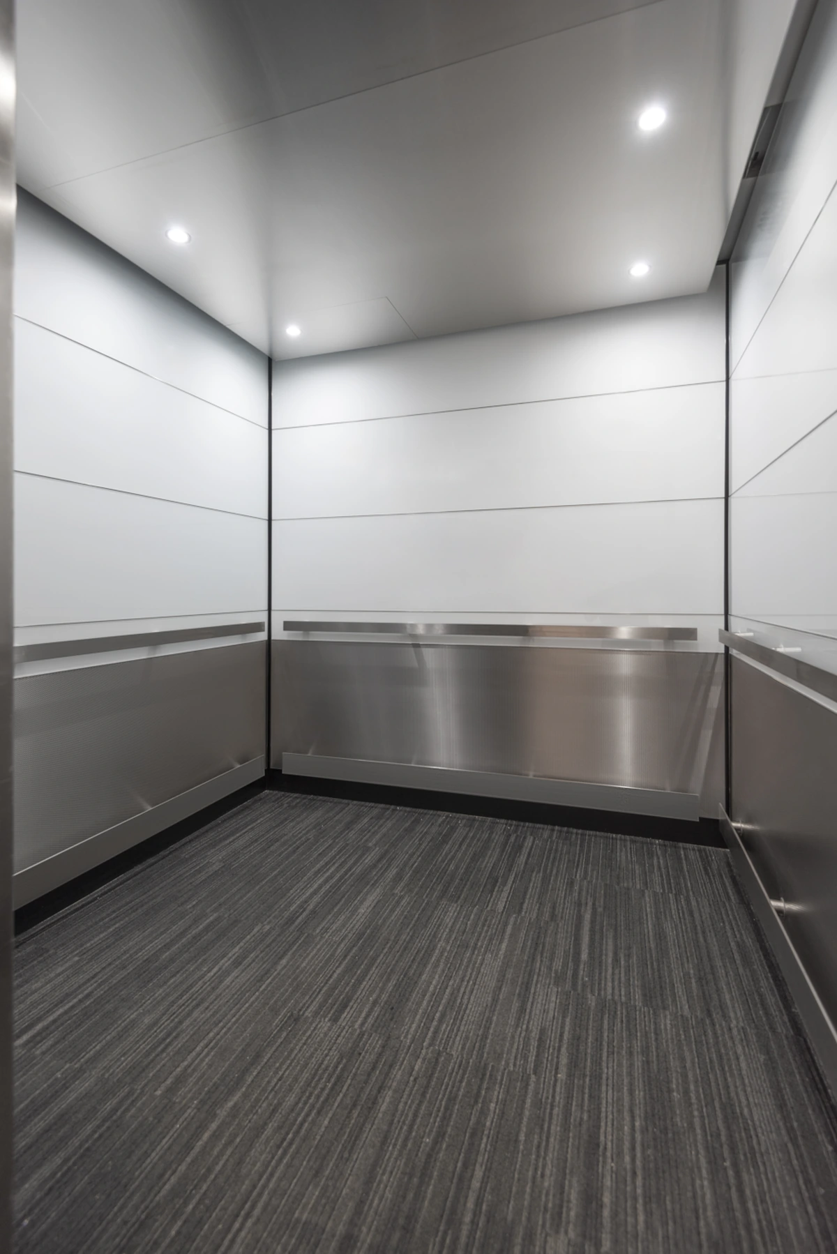 boston-series-elevator-interior-backpainted-white-glass-textured-stainless-3