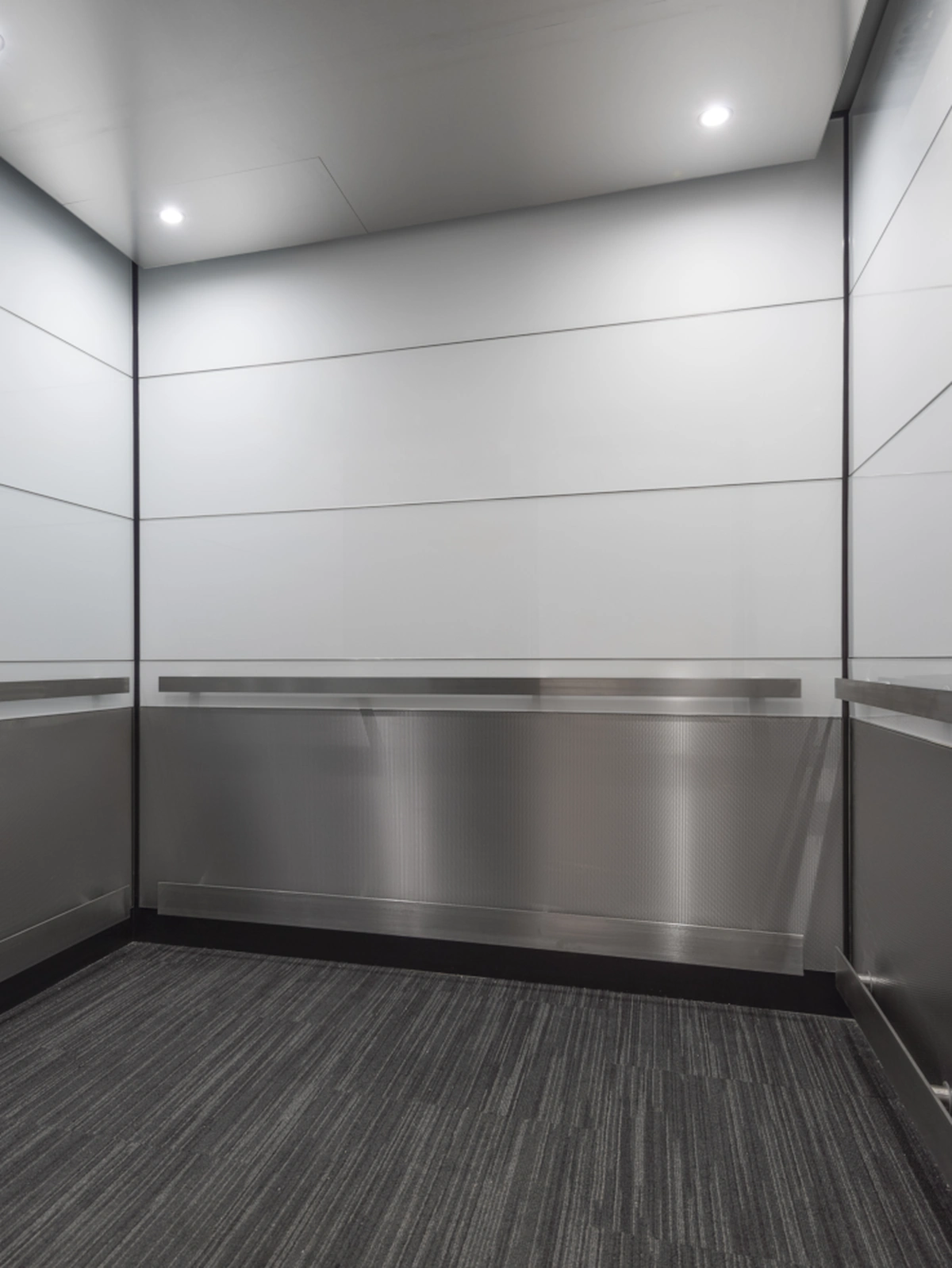 boston-series-elevator-interior-backpainted-white-glass-textured-stainless-4