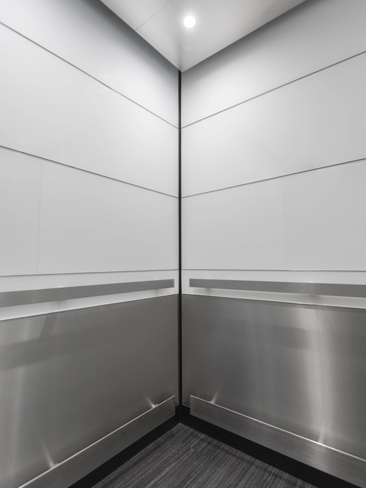 boston-series-elevator-interior-backpainted-white-glass-textured-stainless-8
