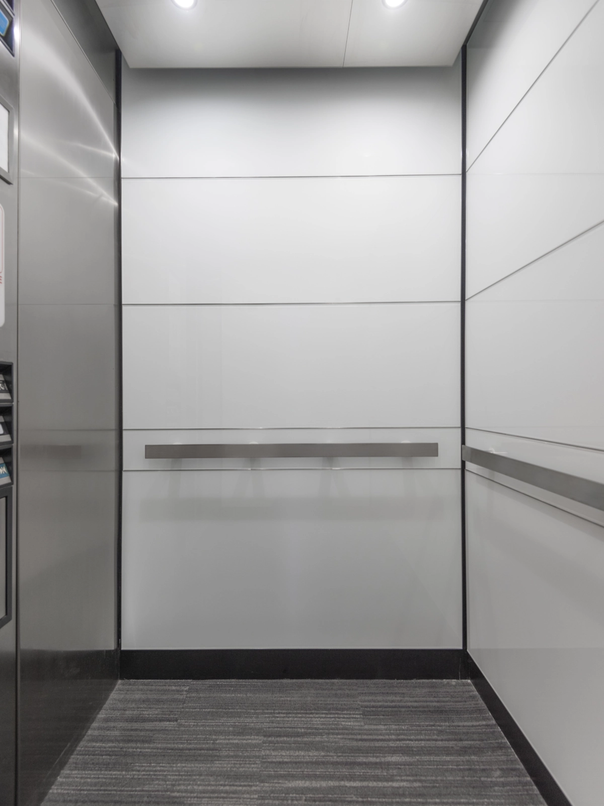 boston-series-elevator-interior-backpainted-white-glass-stainless-frames-1