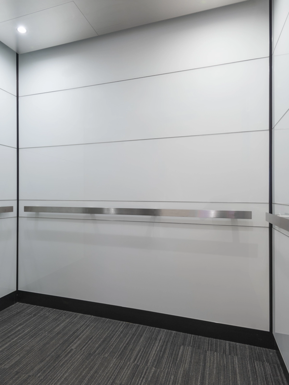 boston-series-elevator-interior-backpainted-white-glass-stainless-frames-4