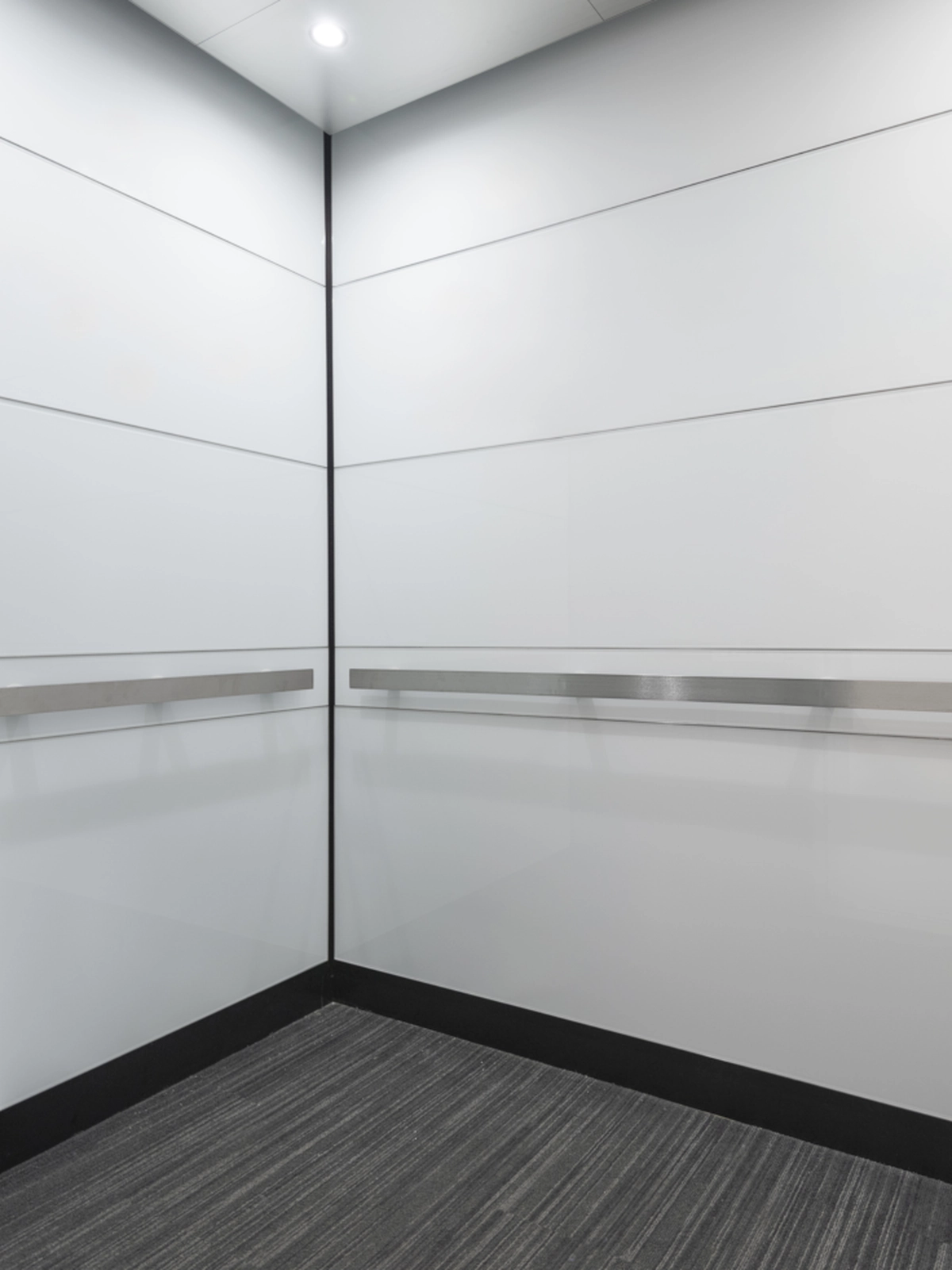 boston-series-elevator-interior-backpainted-white-glass-stainless-frames-8