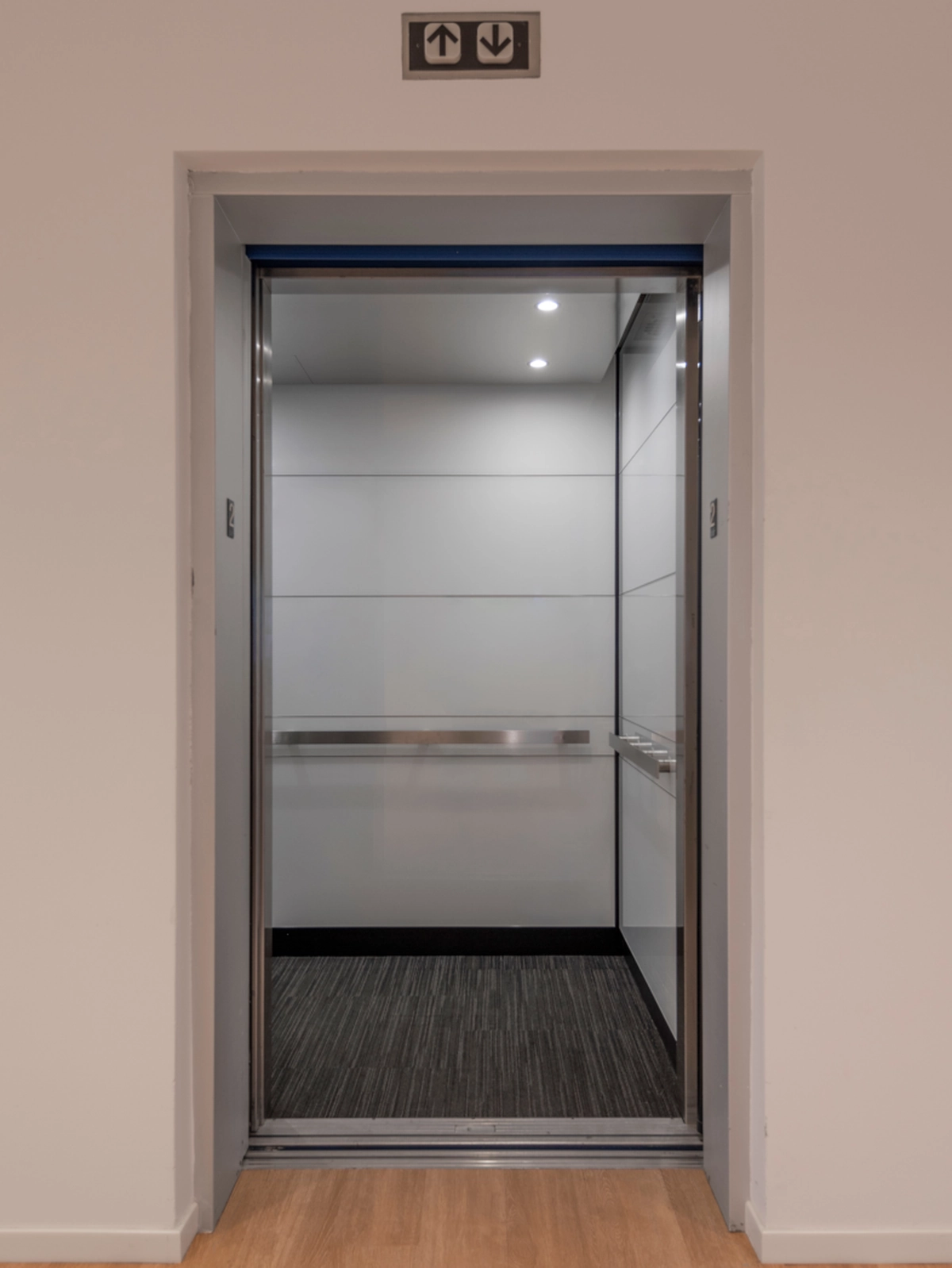 boston-series-elevator-interior-backpainted-white-glass-stainless-frames-9