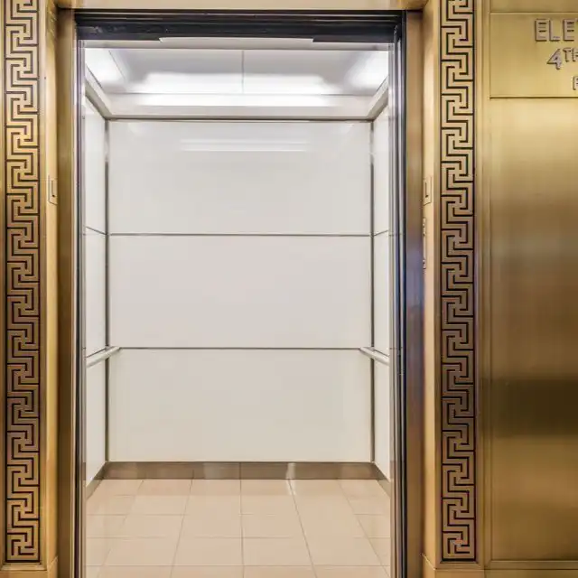 Boston Series back-painted glass elevator cab interior by AED