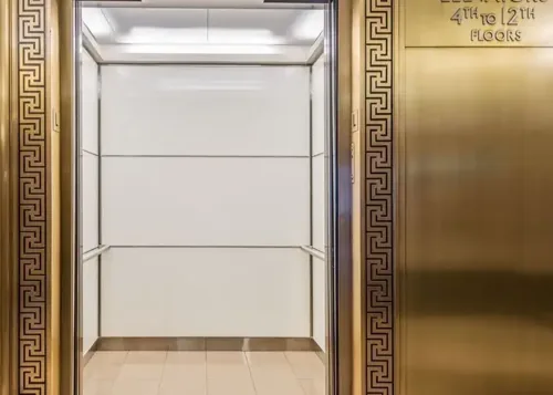 Glass and brass elevator interior — San Francisco Series