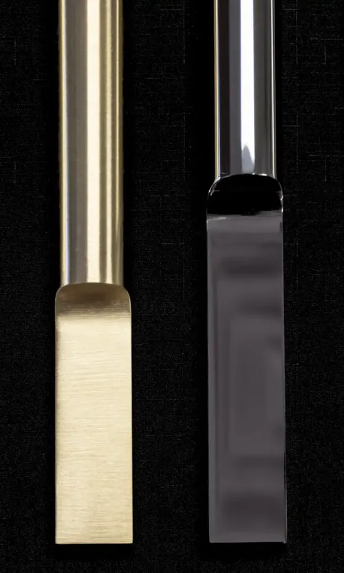 Multiple canoe style handrail finishes in brass and stainless